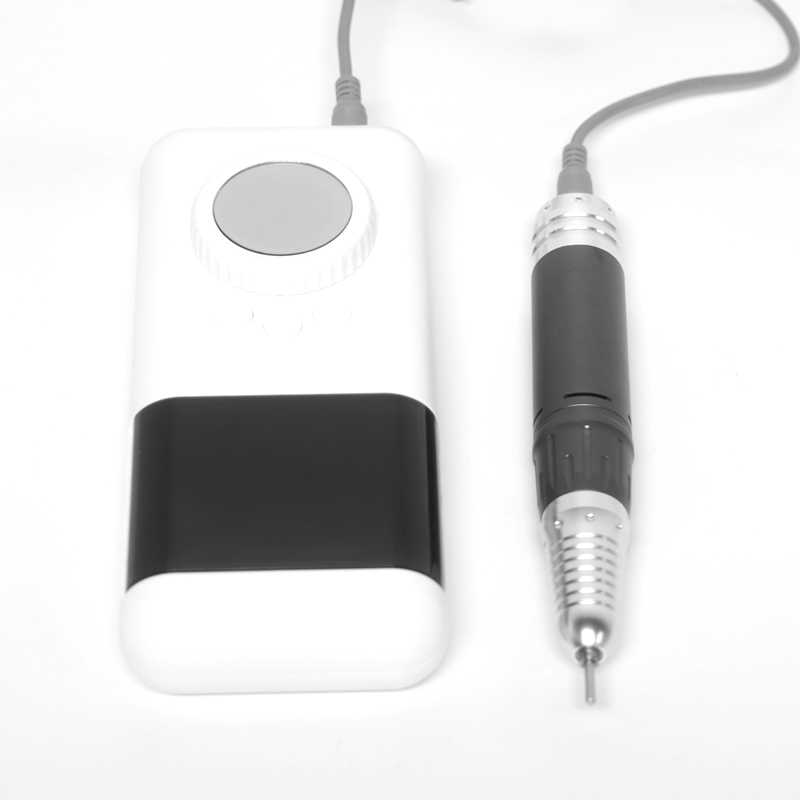 Bel prenosni električni vrtalnik za nohte